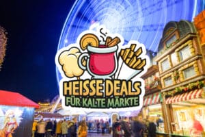 Night colorful atmosphere of Weihnachtsmarkt, Christmas market, in Düsseldorf, the ferris wheel and christmas theme decorated booths set up at the old town.